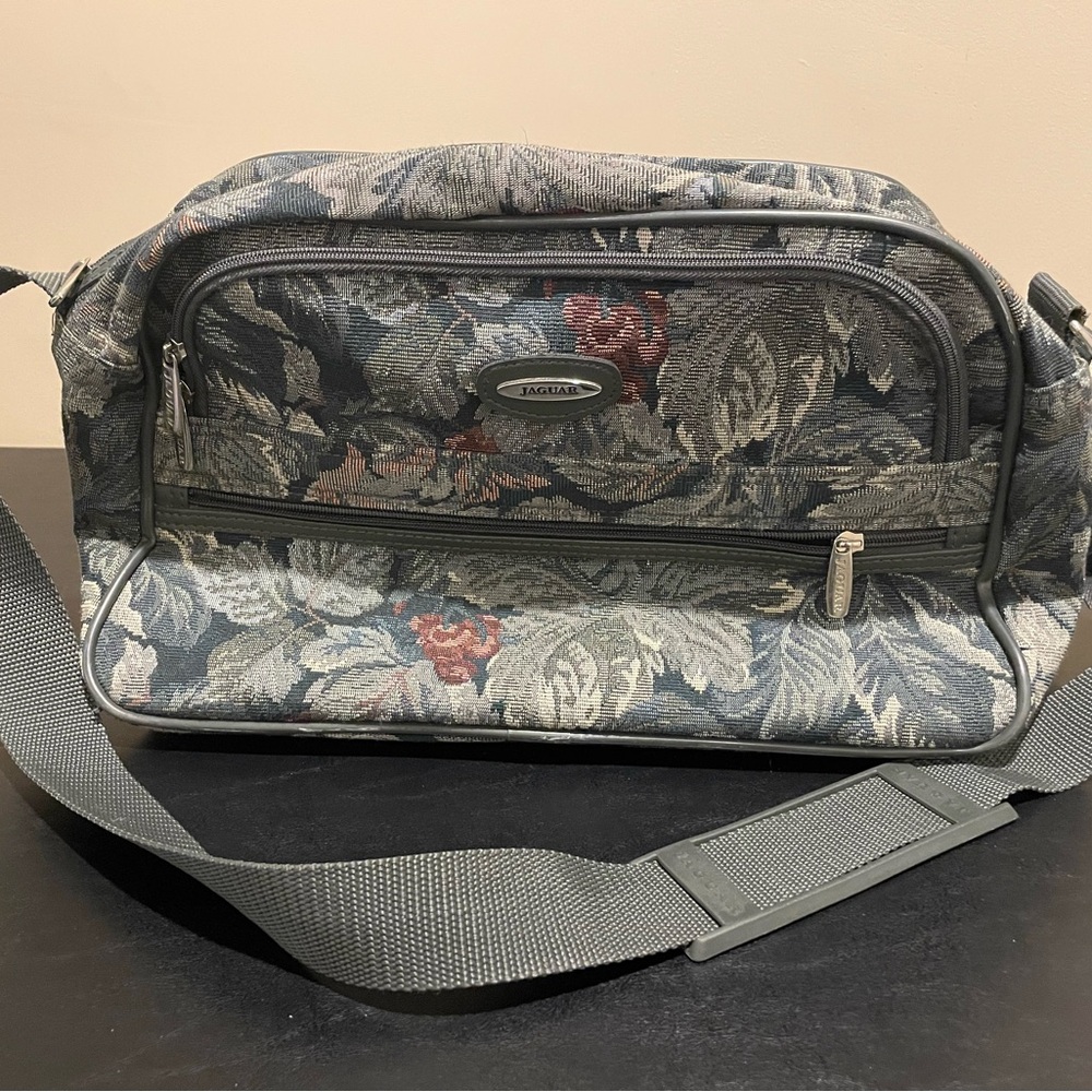 Jaguar brand flora tapestry duffle bag.